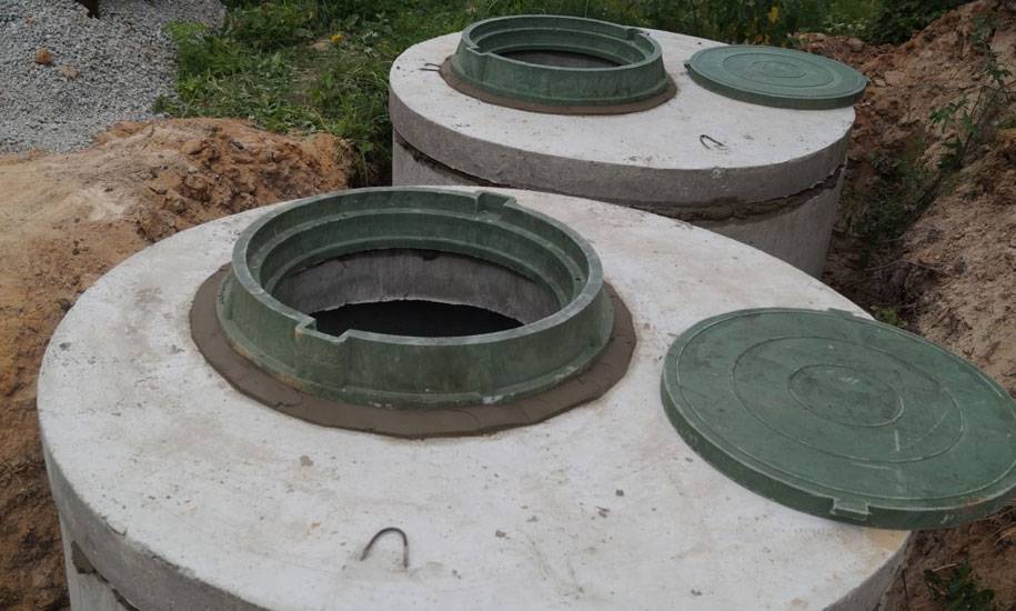Септик из бетонных колец: виды, схема и этапы установки своими руками