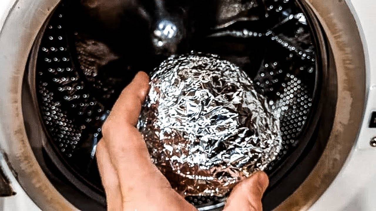 Как помогают шарики при стирке пуховиков в стиральной машине?